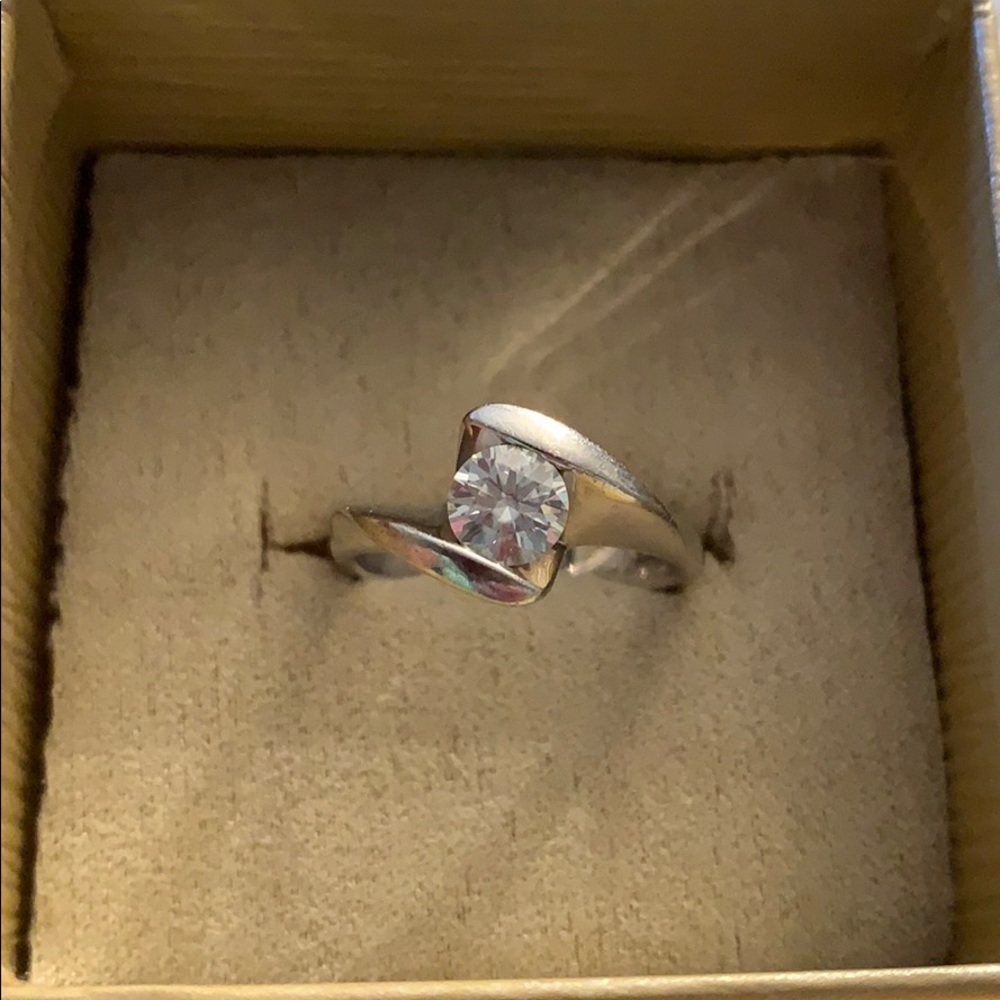 Moissanite Fire .80ct   bypass solitaire ring